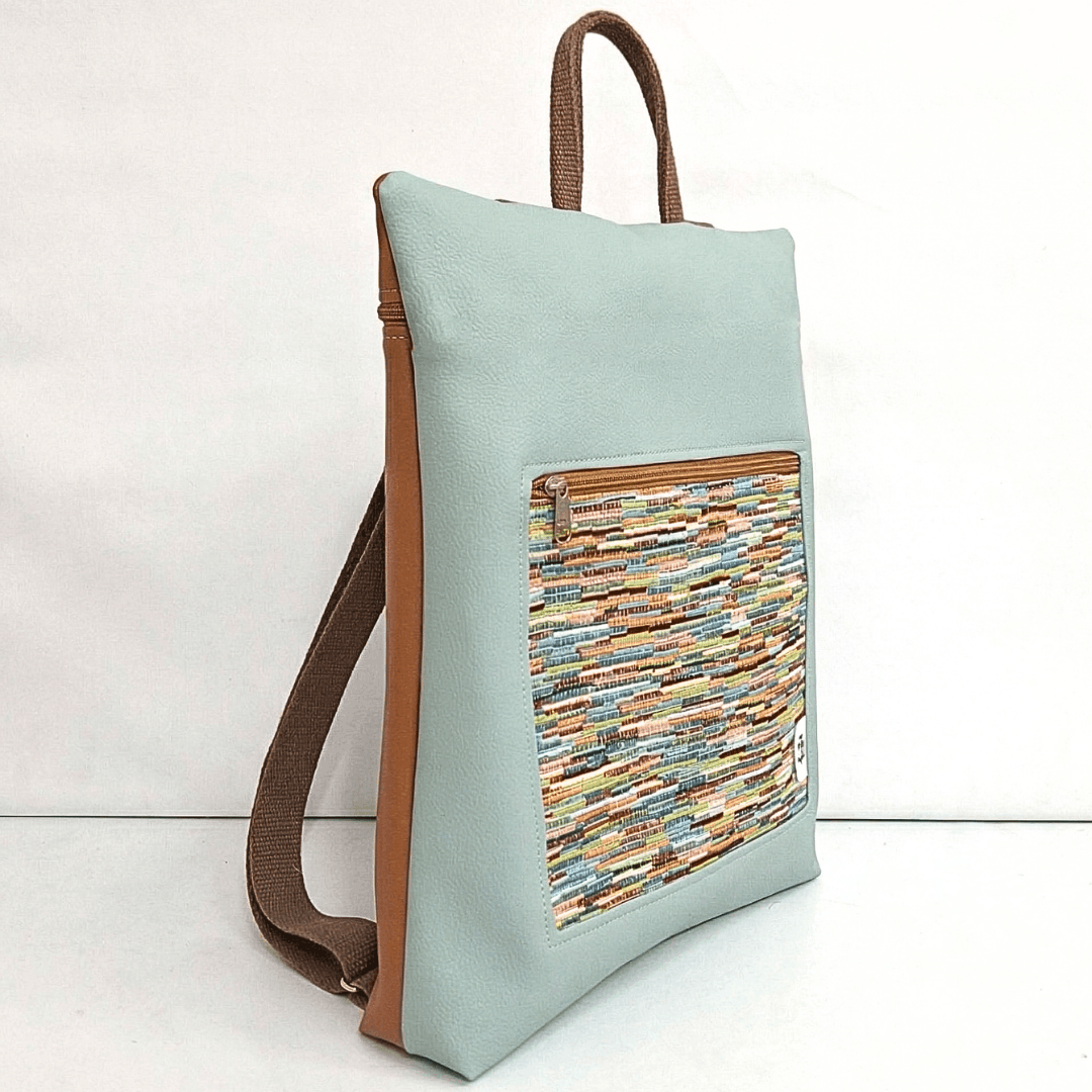 mochila antirrobo rosa menta y marrón Cristina Alba