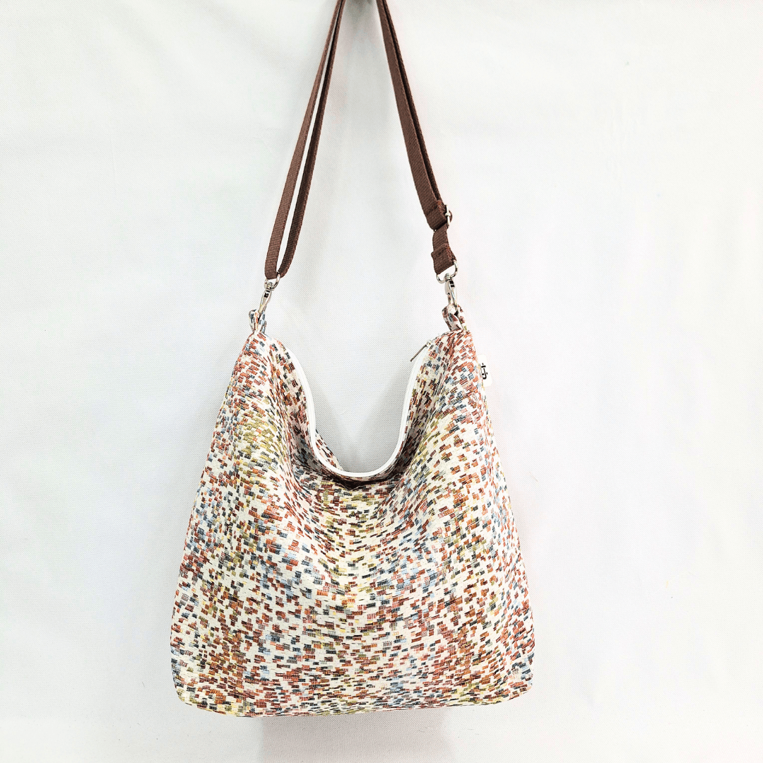 bolso-hobo-tela-colores-sutiles-verano-cristina-alba-frontal