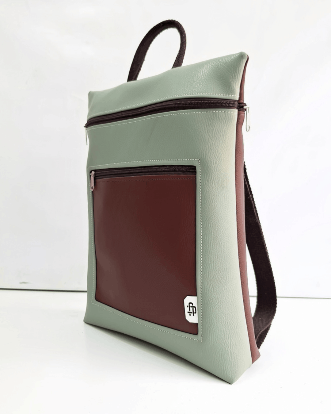 cristina-alba-mochila-mujer-antirrobo-reversible-51-marron-chocolate-verde-salvia