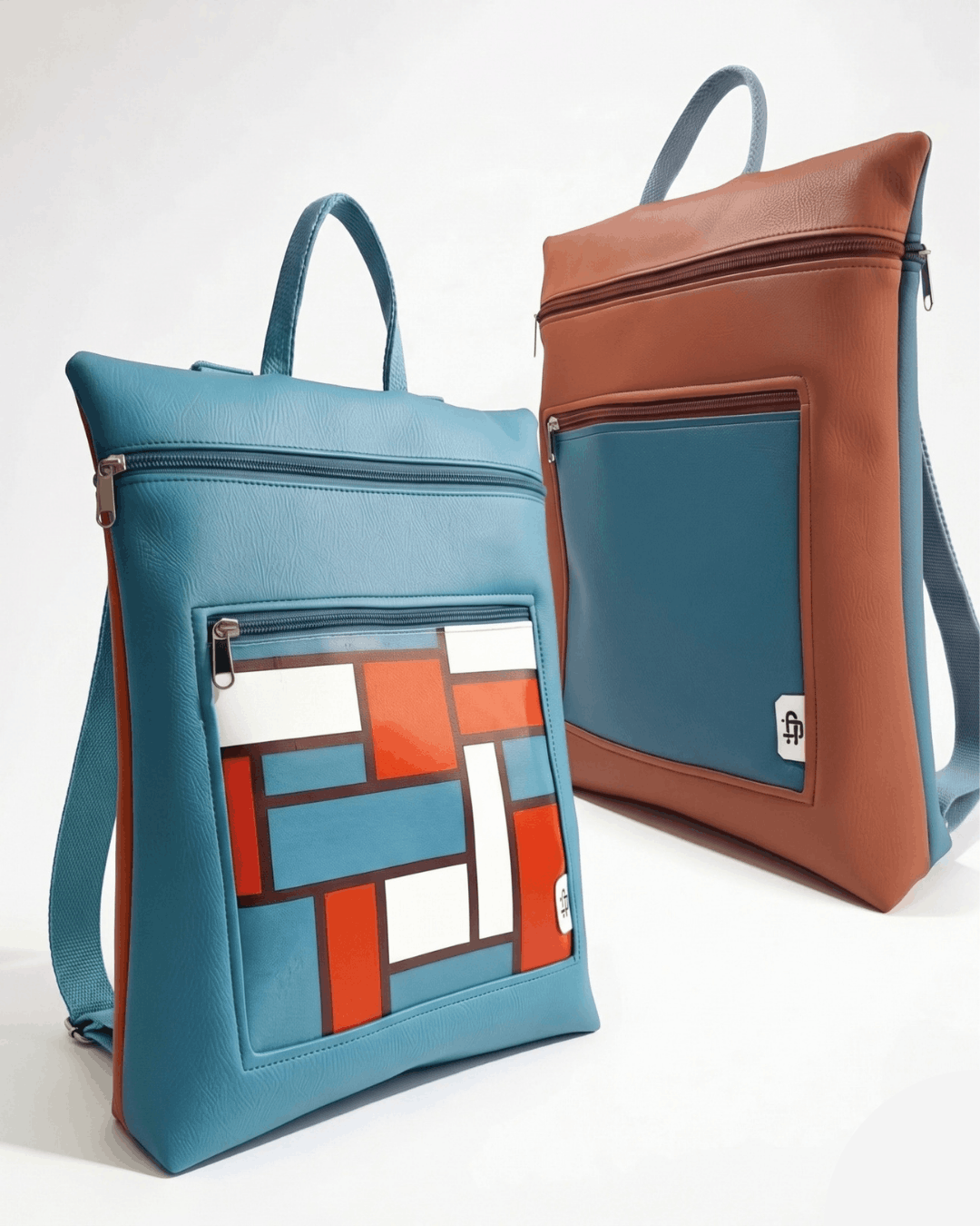 Mochila Antirrobo Reversible PULSO | Azul Báltico y Terracota cristina-alba-mochila-mujer-antirrobo-reversible-71-terracota-teja-azul
