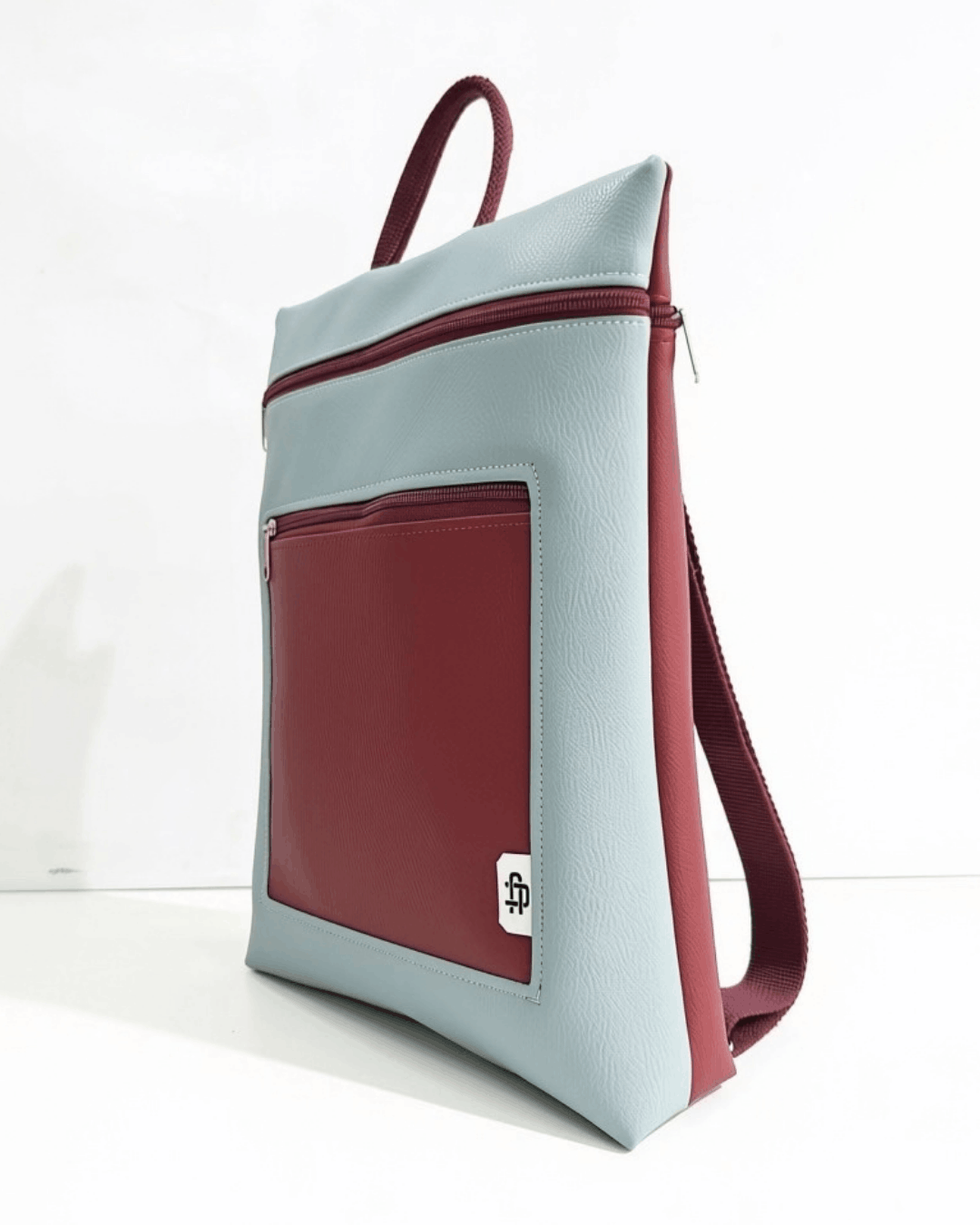 cristina-alba-mochila-mujer-antirrobo-reversible-82-granate-menta