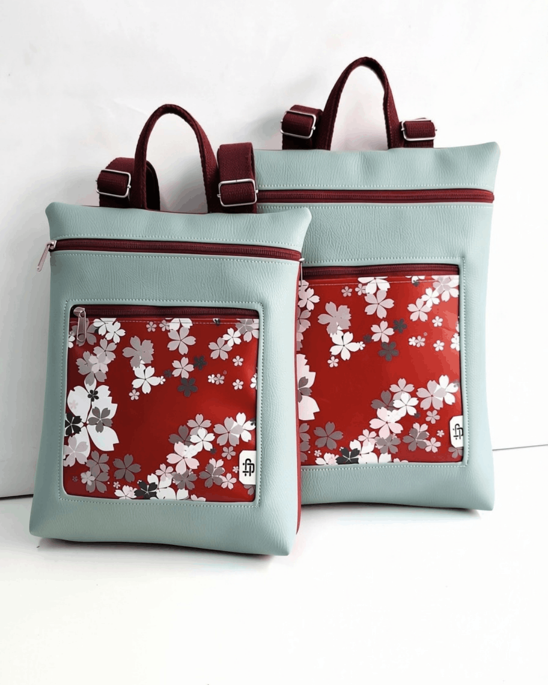 cristina-alba-mochila-mujer-antirrobo-reversible-92-granate-menta