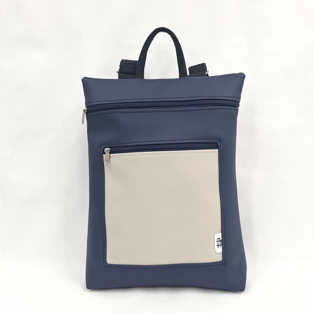 cristina-alba-mochila-reversible-antirrobo-impermeable-2026-05