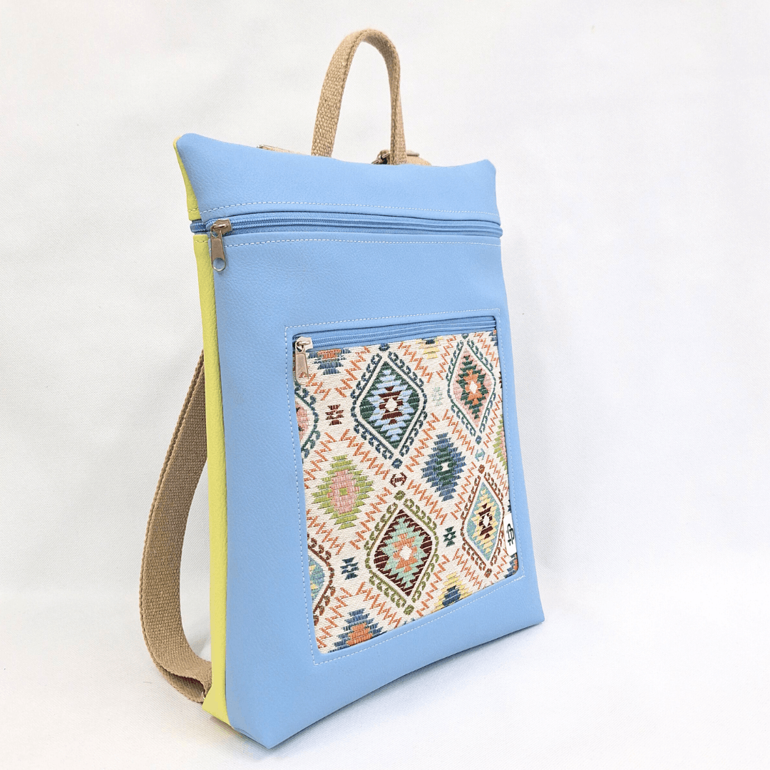 cristina-alba-mochila-reversible-antirrobo-impermeable-2026-104