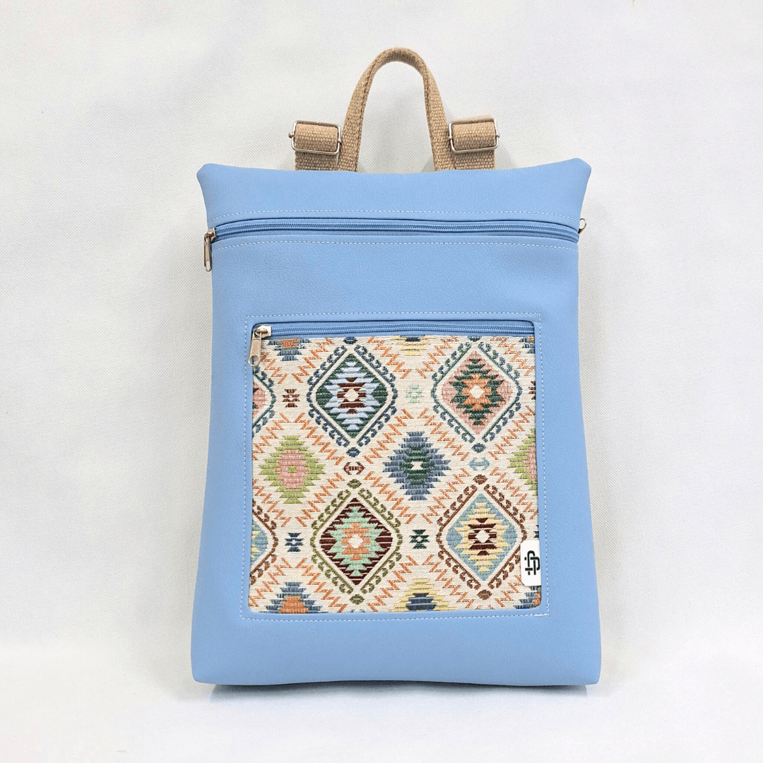 cristina-alba-mochila-reversible-antirrobo-impermeable-2026-105