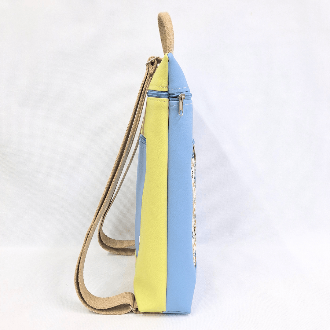 cristina-alba-mochila-reversible-antirrobo-impermeable-2026-106