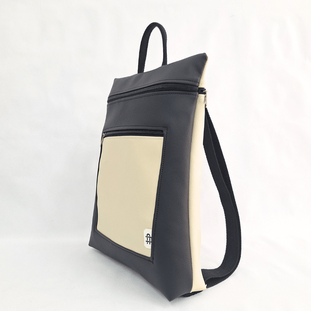 cristina-alba-mochila-reversible-antirrobo-impermeable-2026-113