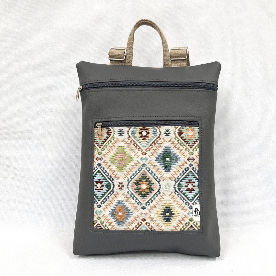 cristina-alba-mochila-reversible-antirrobo-impermeable-2026-126