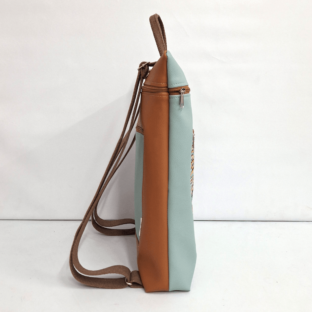 cristina-alba-mochila-reversible-antirrobo-impermeable-2026-138