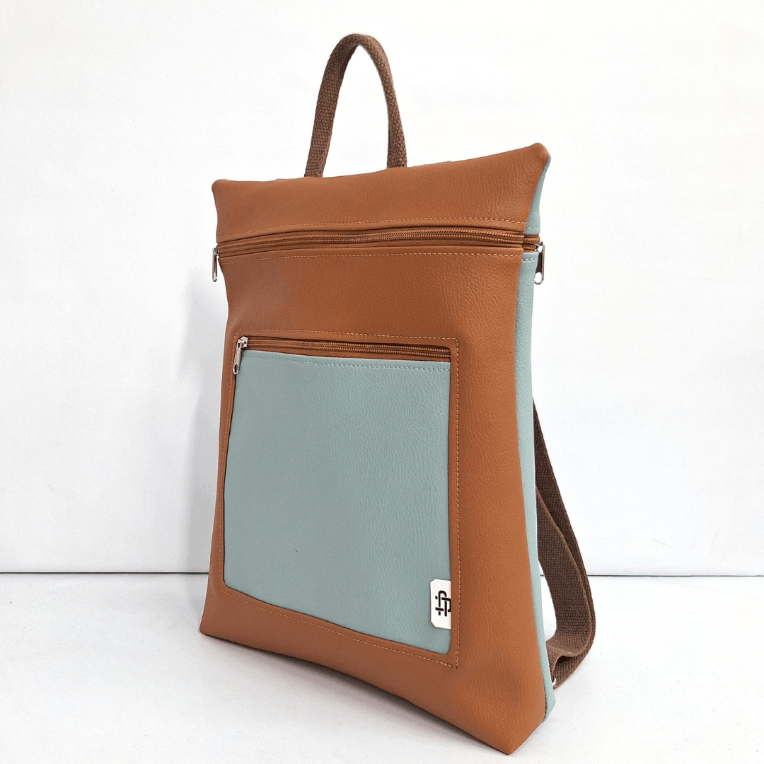 cristina-alba-mochila-reversible-antirrobo-impermeable-2026-140