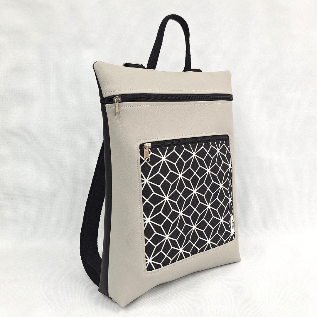 cristina-alba-mochila-reversible-antirrobo-impermeable-2026-26