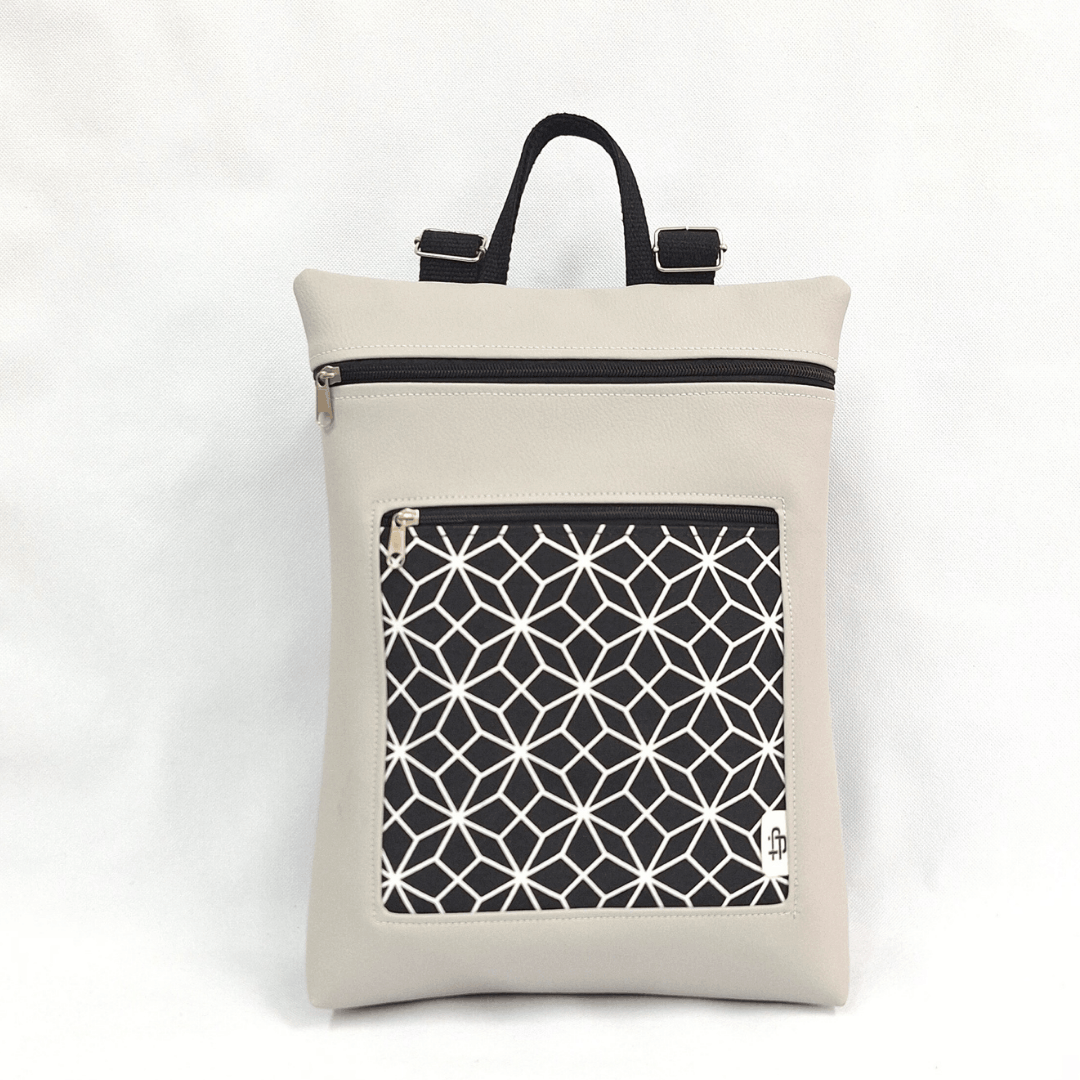 cristina-alba-mochila-reversible-antirrobo-impermeable-2026-27