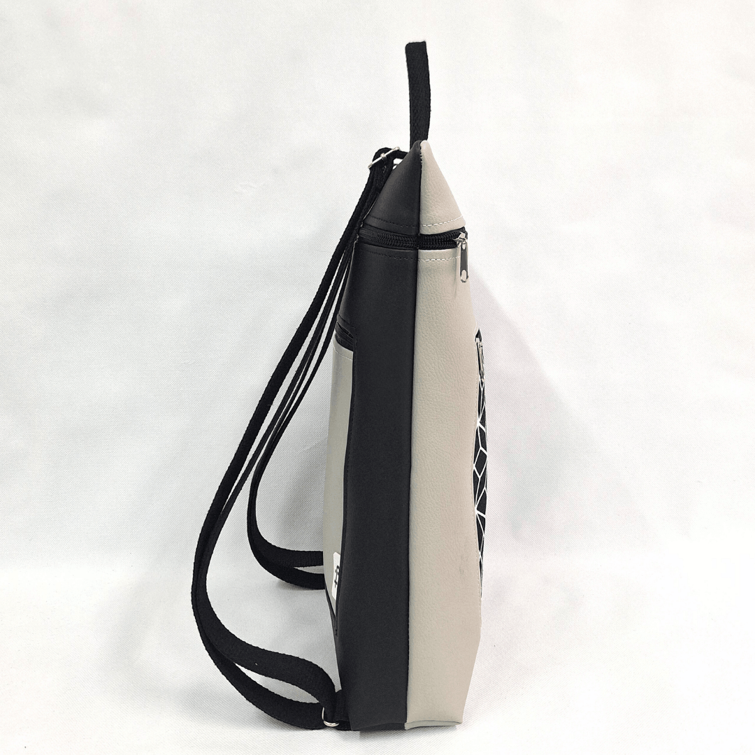 cristina-alba-mochila-reversible-antirrobo-impermeable-2026-28