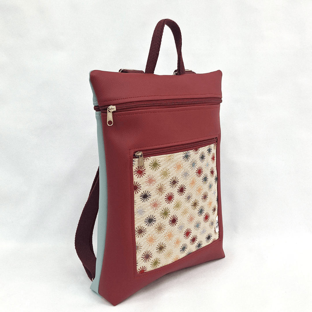 cristina-alba-mochila-reversible-antirrobo-impermeable-2026-42