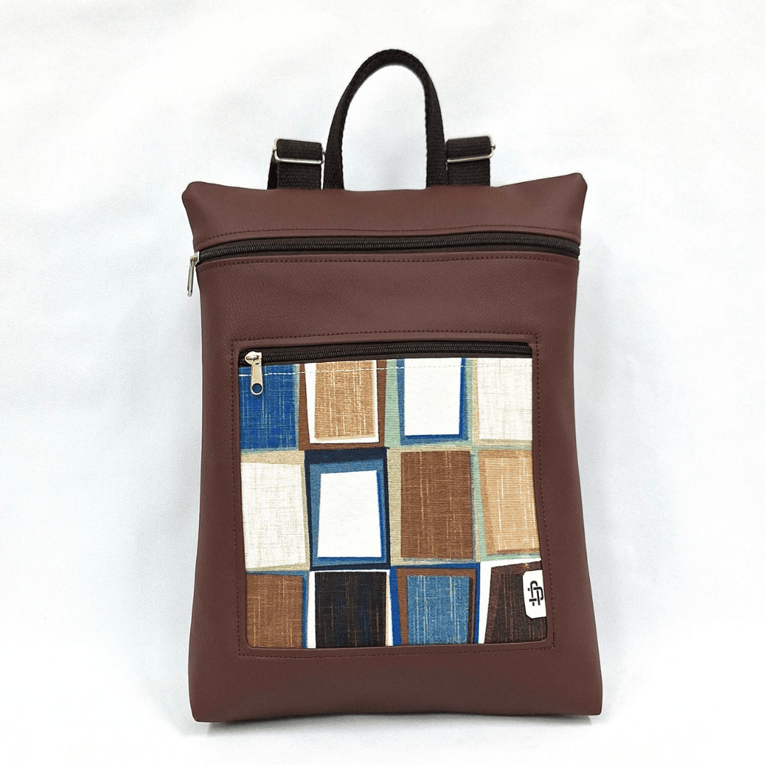 cristina-alba-mochila-reversible-antirrobo-impermeable-2026-59