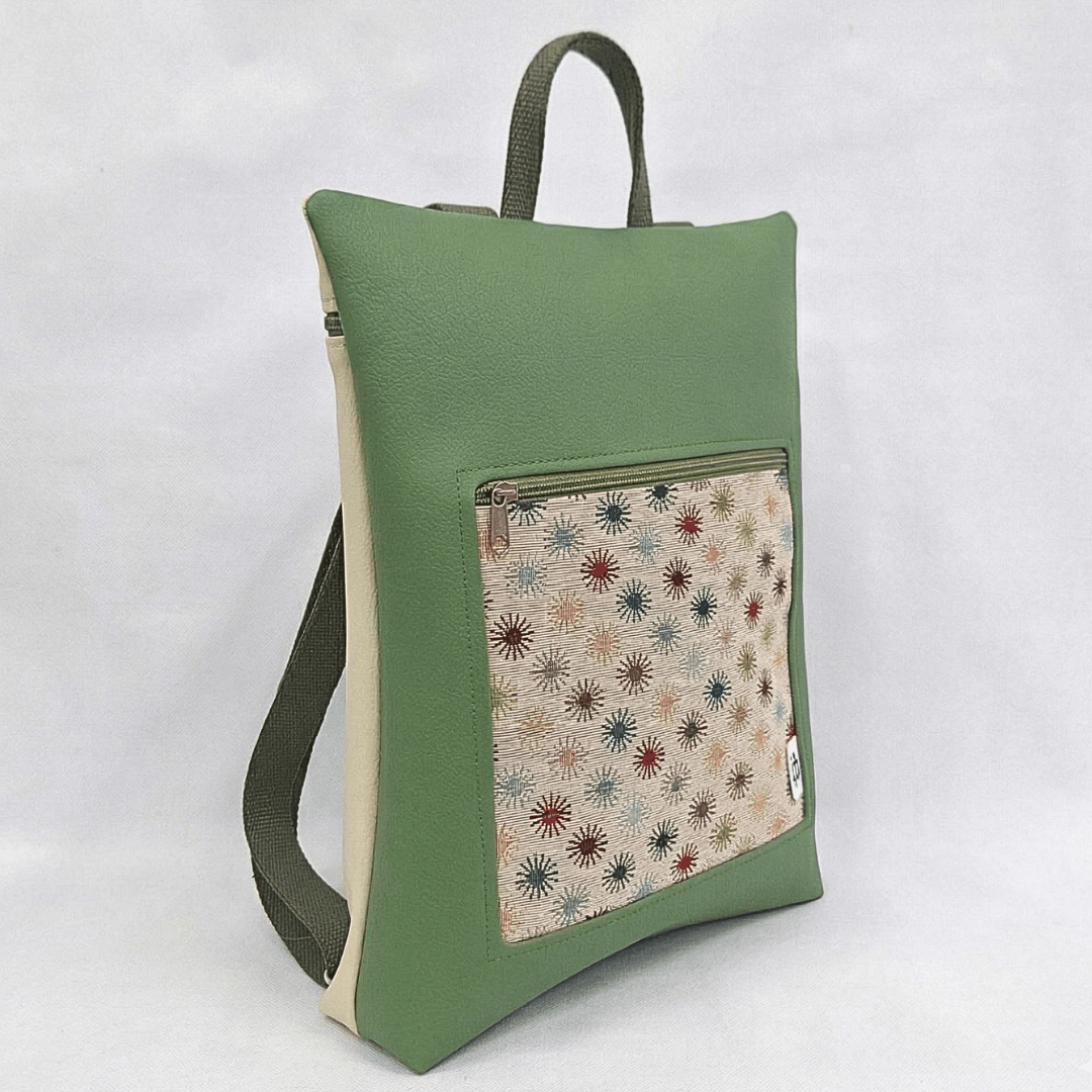 mochila-antirrobo-mujer-destellos-verde-crema-estampado-cristina-alba