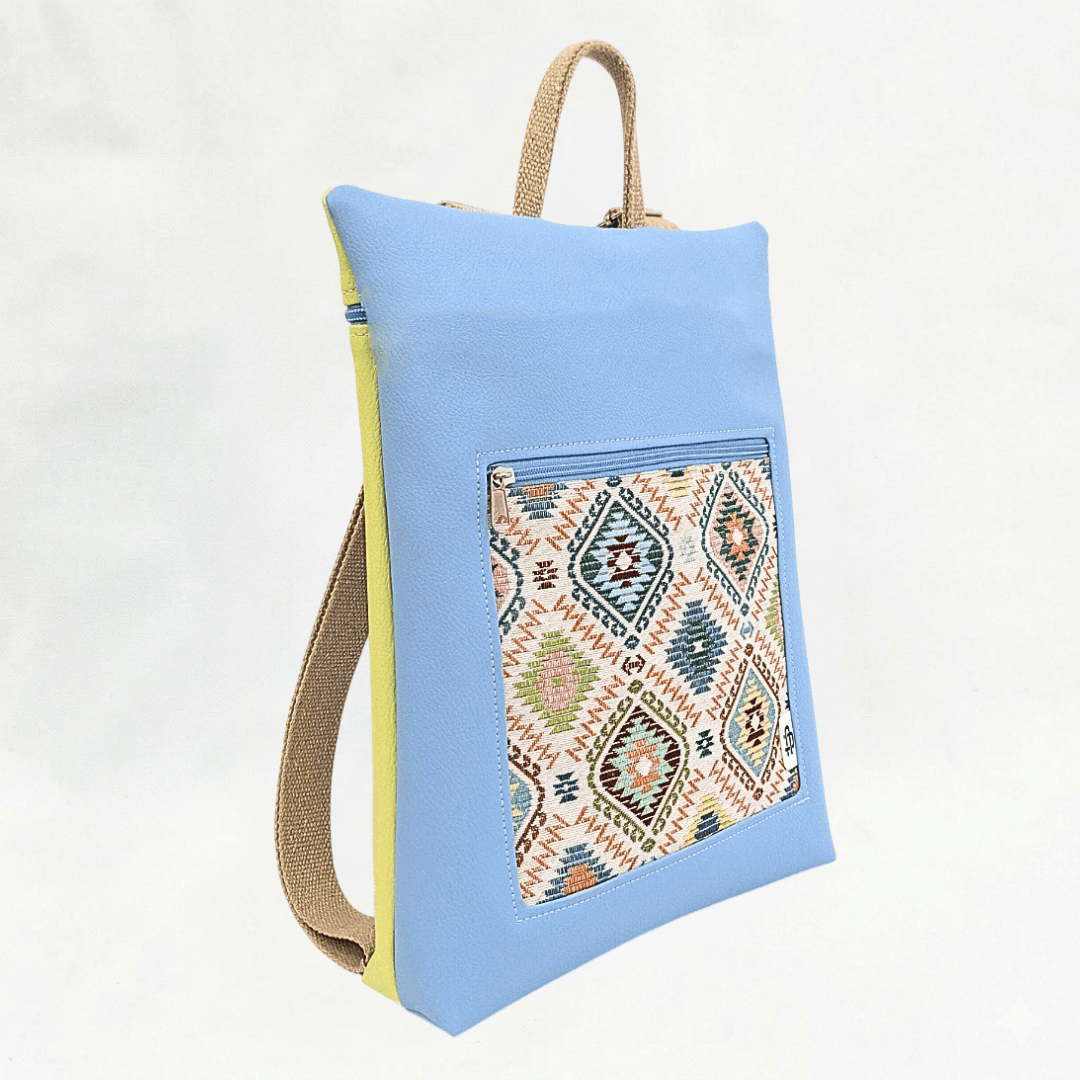 mochila-antirrobo-mujer-india-azul-celeste-amarillo-portada-cristina-alba