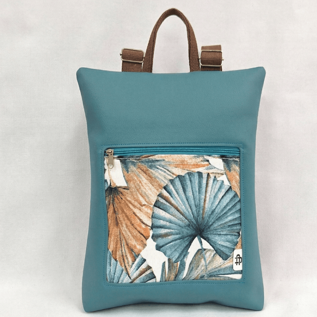 mochila-antirrobo-mujer-tropical-turquesa-nude-rectangular-cristina-alba