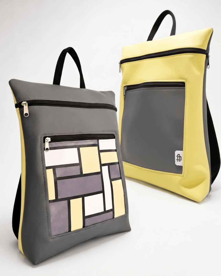 cristina-alba-mochila-mujer-antirrobo-reversible-01-gris-marengo-amarillo_1268846727