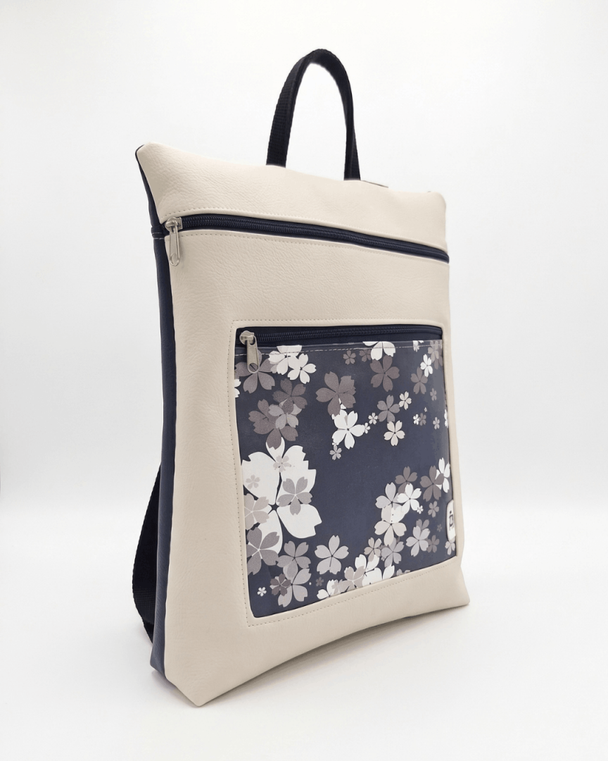 cristina-alba-mochila-mujer-antirrobo-reversible-126-crema-azul-marino