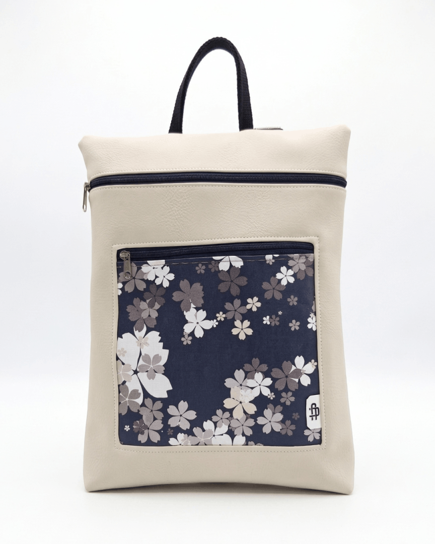 cristina-alba-mochila-mujer-antirrobo-reversible-127-crema-azul-marino