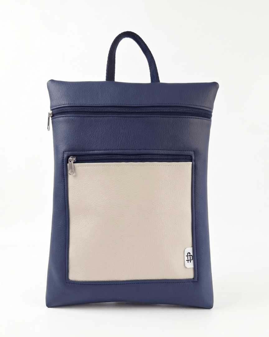 cristina-alba-mochila-mujer-antirrobo-reversible-130-crema-azul-marino
