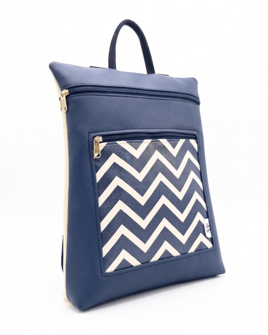 cristina-alba-mochila-mujer-antirrobo-reversible-133-crema-azul-marino