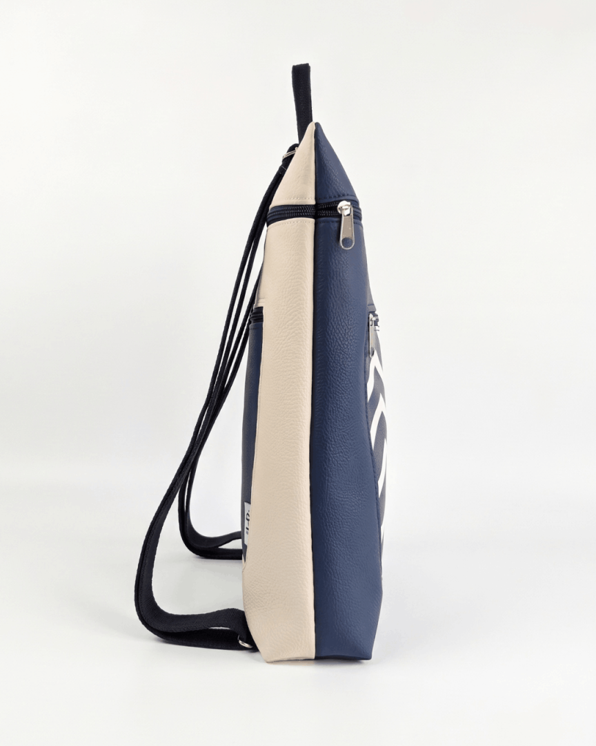 cristina-alba-mochila-mujer-antirrobo-reversible-135-crema-azul-marino