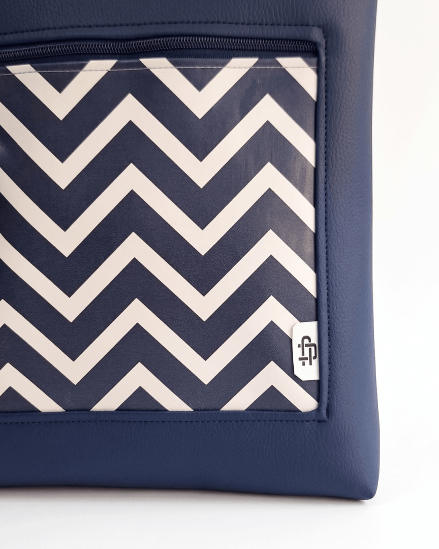 cristina-alba-mochila-mujer-antirrobo-reversible-138-crema-azul-marino