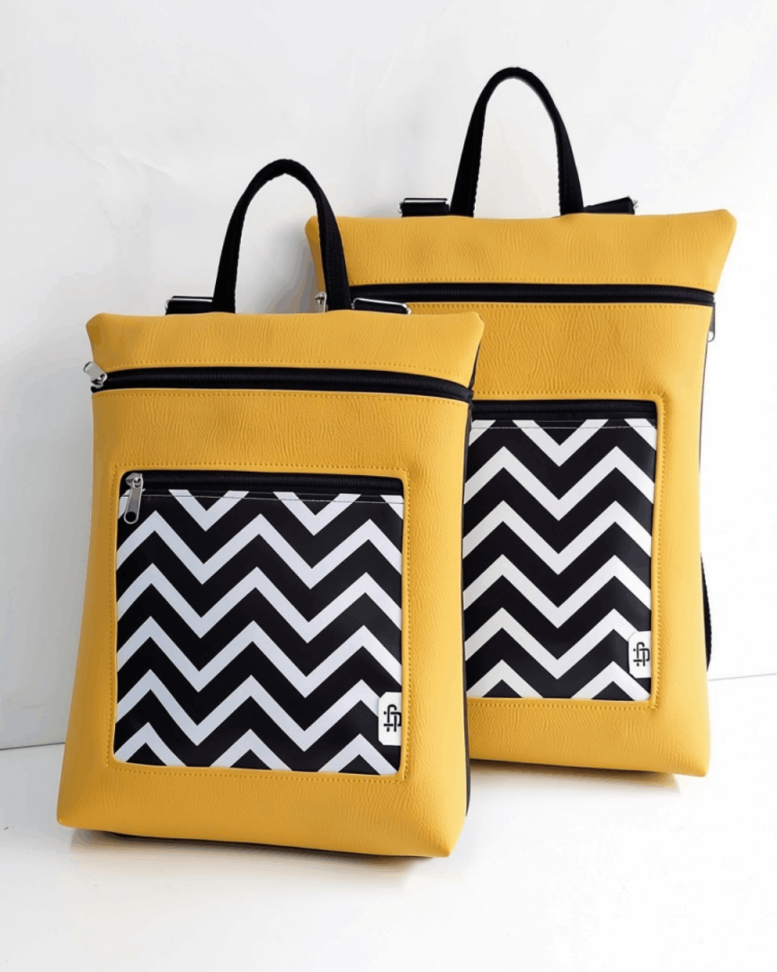 cristina-alba-mochila-mujer-antirrobo-reversible-31-amarillo-mostaza-negro