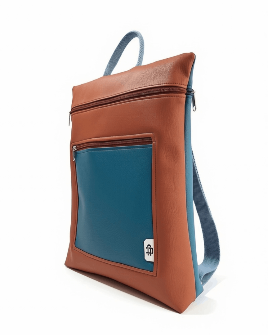 cristina-alba-mochila-mujer-antirrobo-reversible-75-terracota-teja-azul