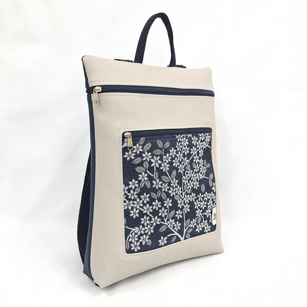 cristina-alba-mochila-reversible-antirrobo-impermeable-2026-02